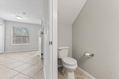 Freshly painted 2-bedroom, 2-bath townhome-style condo in a - photo 13