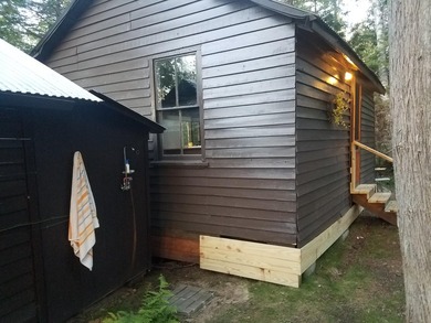 Main camp built in the 1960's with drilled well and septic. A - photo 22