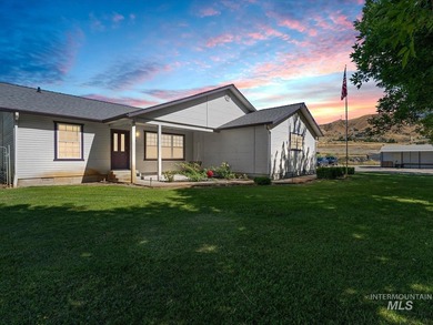 Nestled at the base of Emmett's desirable southeast hills, this - photo 1