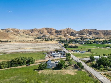 Nestled at the base of Emmett's desirable southeast hills, this - photo 5