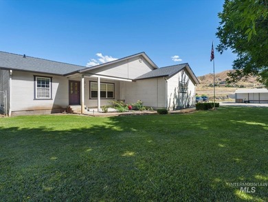 Nestled at the base of Emmett's desirable southeast hills, this - photo 6