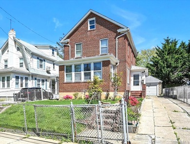 Stately detached all-brick Colonial with timeless curb appeal - photo 1