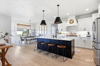 Experience this custom-built 3-bedroom, 2.5-bath home with a - photo 3