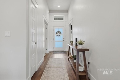 Welcome to this exquisite semi-custom built Schroeder home - photo 3