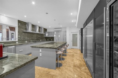 Situated on iconic South Miami Avenue, this exceptional luxury - photo 16