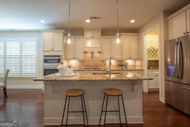 Discover easy living in this beautifully designed, freshly - photo 4