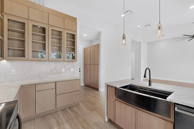 Experience modern waterfront luxury in this stunning - photo 12