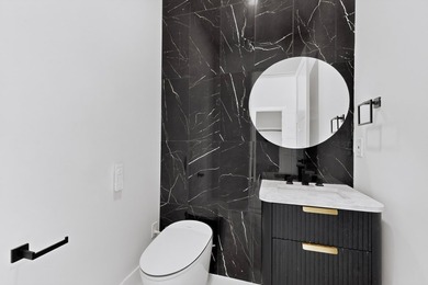 Experience modern waterfront luxury in this stunning - photo 13