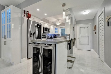 Experience effortless South Florida living in this fully - photo 14