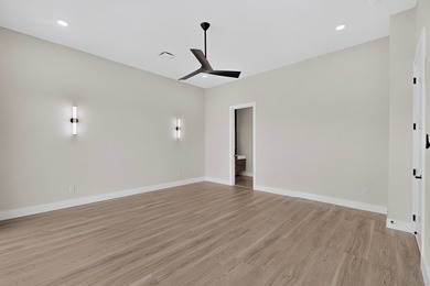 Experience modern waterfront luxury in this stunning - photo 15