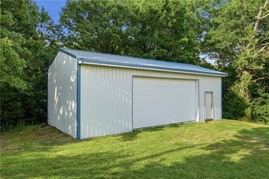 Positioned on 10.29 acres in a scenic Ozark Mountain setting - photo 18