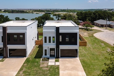 Experience modern waterfront luxury in this stunning - photo 19