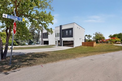 Experience modern waterfront luxury in this stunning - photo 20