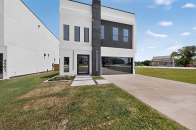 Experience modern waterfront luxury in this stunning - photo 21