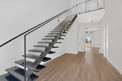Experience modern waterfront luxury in this stunning - photo 22