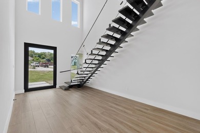 Experience modern waterfront luxury in this stunning - photo 23