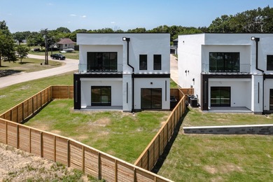 Experience modern waterfront luxury in this stunning - photo 28