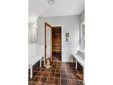 Hidden among mature trees on a rare double lot, this exceptional - photo 30