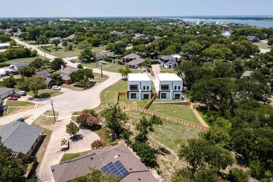 Experience modern waterfront luxury in this stunning - photo 32
