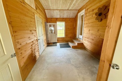 End-of-the-road privacy meets stunning riverfront living in this - photo 2