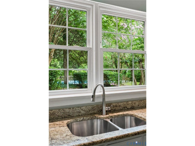 Hidden among mature trees on a rare double lot, this exceptional - photo 45