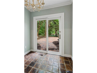 Hidden among mature trees on a rare double lot, this exceptional - photo 47