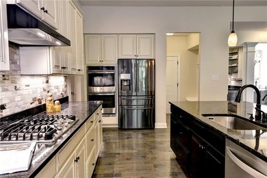 Exquisite Ellington model by Ryan Homes, gracefully situated on - photo 13
