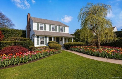 You will fall in love with this stunning colonial home in the - photo 1