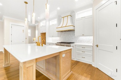 New custom home by ARK Builders, this Gold Fortified waterfront - photo 35