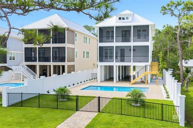 New custom home by ARK Builders, this Gold Fortified waterfront - photo 47