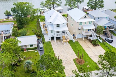 New custom home by ARK Builders, this Gold Fortified waterfront - photo 50