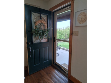 Nestled into a quiet cove, this 1 1/2 story home offers 3 - photo 3