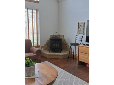 Nestled into a quiet cove, this 1 1/2 story home offers 3 - photo 6