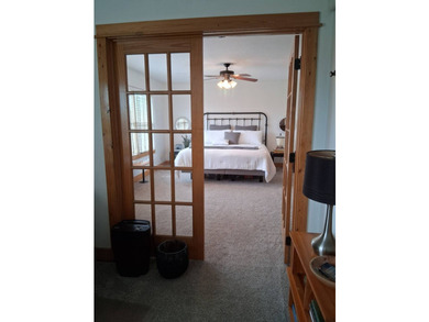 Nestled into a quiet cove, this 1 1/2 story home offers 3 - photo 9