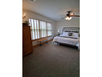 Nestled into a quiet cove, this 1 1/2 story home offers 3 - photo 10