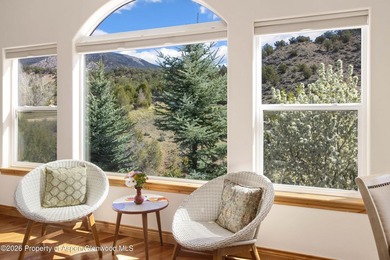 This inviting home features panoramic mountain views and a - photo 8