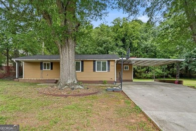 Welcome to 4130 McClure Drive in beautiful Oakwood, GA! This - photo 1