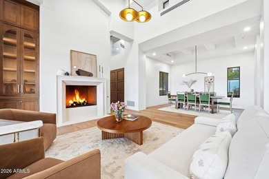 Framed by sweeping views of Pinnacle Peak and city lights, this