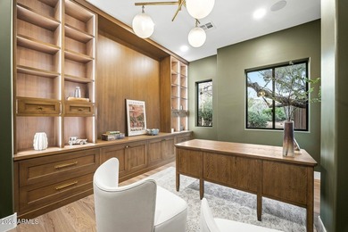 Framed by sweeping views of Pinnacle Peak and city lights, this