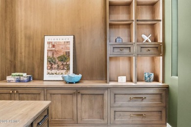 Framed by sweeping views of Pinnacle Peak and city lights, this