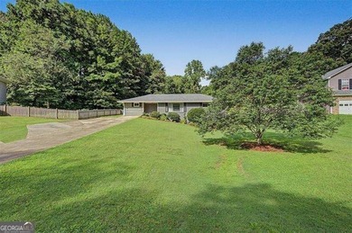 Step into this charming 4-bedroom, 2-bath brick beauty in Cobb - photo 2