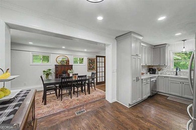 Step into this charming 4-bedroom, 2-bath brick beauty in Cobb - photo 5
