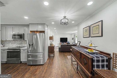 Step into this charming 4-bedroom, 2-bath brick beauty in Cobb - photo 6