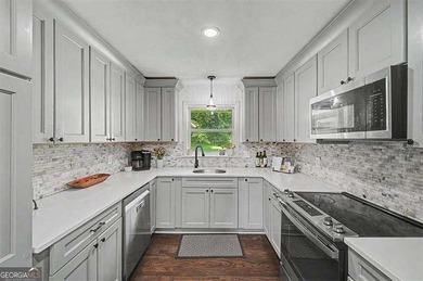 Step into this charming 4-bedroom, 2-bath brick beauty in Cobb - photo 7
