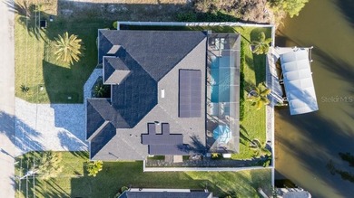 This Gulf access pool home in Cape Coral offers a rare blend of - photo 49