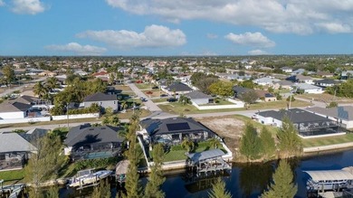 This Gulf access pool home in Cape Coral offers a rare blend of - photo 54