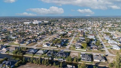 This Gulf access pool home in Cape Coral offers a rare blend of - photo 56