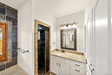 Set on a full acre in the exclusive gated community of Raintree - photo 12