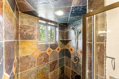 Set on a full acre in the exclusive gated community of Raintree - photo 13