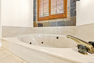 Set on a full acre in the exclusive gated community of Raintree - photo 14